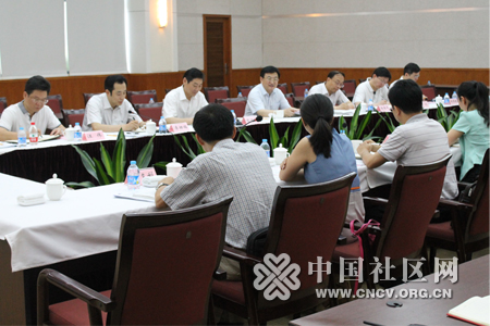 中组部调研组吴玉良部委一行调研百步亭.jpg
